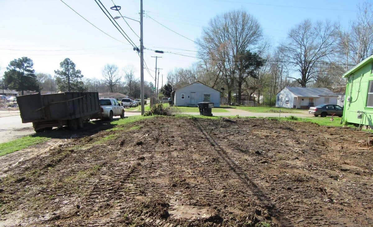 The same residential lot cleared and graded after the debris was hauled away